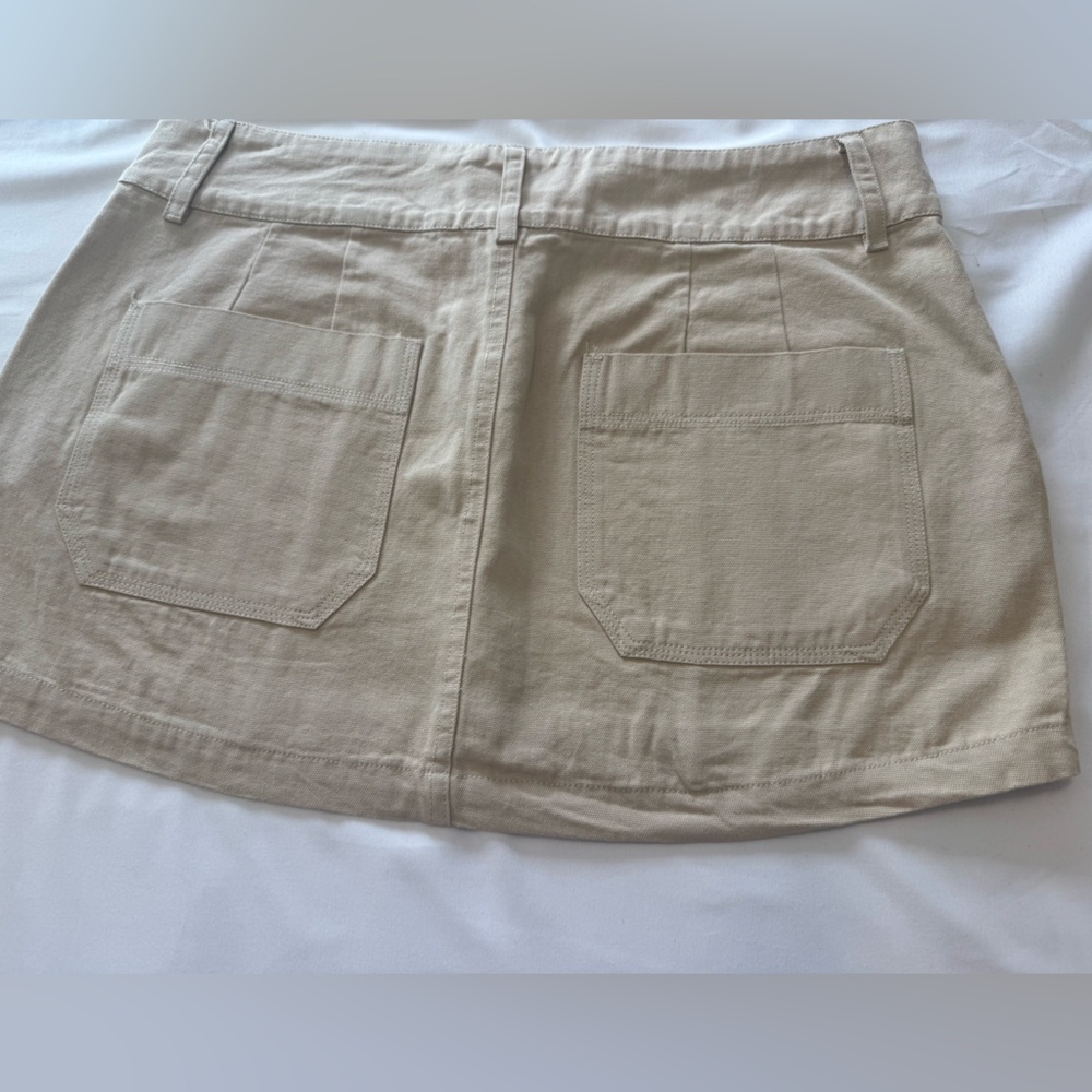 Beige Mini Skirt with Front Patch Pockets